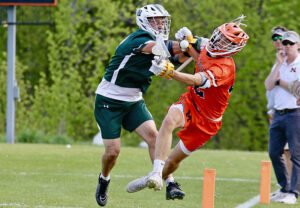 Tiger boys’ lacrosse gets past Woodstock in OT
