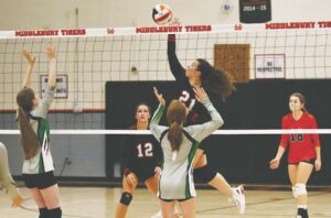 Girls’ volleyball splits matches