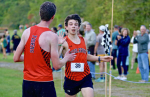 MUHS hosts first cross country meet in years; Tiger boys win