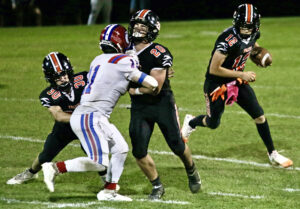 Tiger football can’t contain Hurricanes, fall in Friday showdown