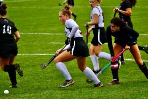 Eagle field hockey advances