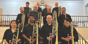Trombone choir plays the Little City