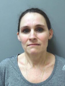 Auclair pleads guilty to killing her husband