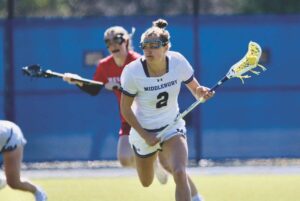 Undefeated women’s lax survives challenge