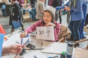 College students give youngsters a global perspective