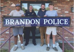 Students make new sign for Brandon Police