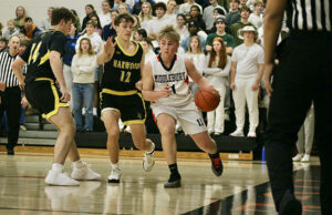 Tiger basketball challenges Harwood, but Highlander boys pull out the win