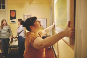 Bid local. Buy local. Sheldon Museum opens season with art auction