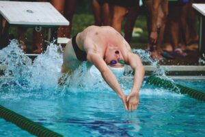 Vergennes Champs split two swim meets
