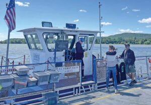 Captain Jack guides the ferry across Lake Champlain