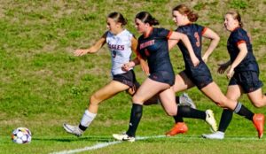 Eagle girls roll past host Tigers