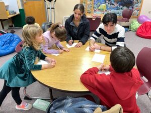 Local high school, elementary students connect through DREAM mentoring program