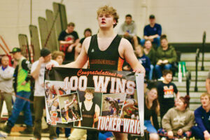 Two Tiger wrestlers, and one Eagle, pass the century mark